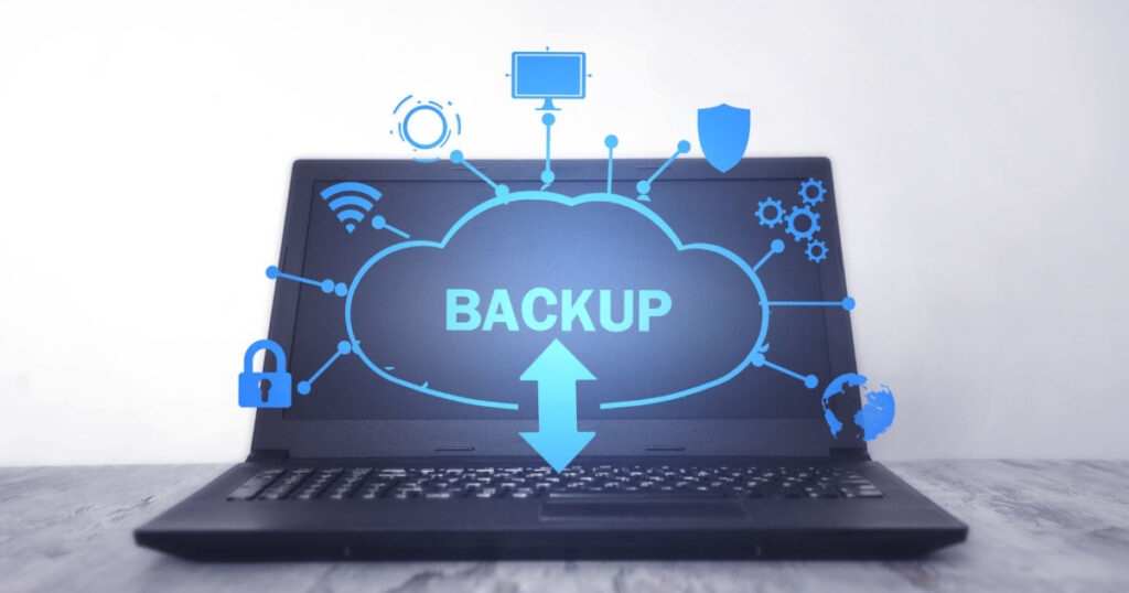 Data Backup and Recovery Image featuring a cloud on a laptop